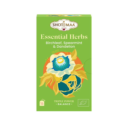 A box of SHOTI MAA Essential Herbs infusion tea with organic birchleaf, spearmint, and dandelion. The packaging is green with an illustration of a flower and leaves.
